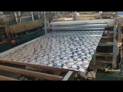 baja tahan karat terukir